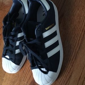 Never worn adidas superstar blue suede sneakers